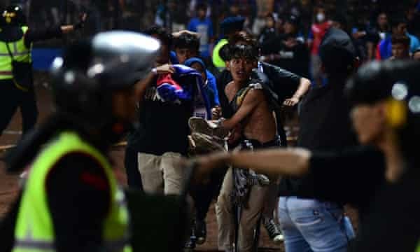 At least 174 dead after crowd crush at Indonesian football match